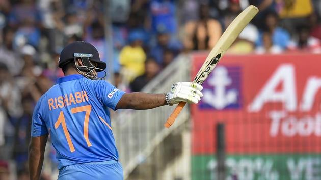 Indian batsman Rishabh Pant raises his bat after completing his half-century(PTI) Indian batsman Rishabh Pant raises his bat after completing his half-century(PTI)