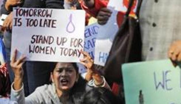Women activists hold banners and shout slogans demanding justice in the case of a veterinarian who was gang-raped and killed last week, during a protest in New Delhi, India, Tuesday, Dec. 3, 2019.(AP) Women activists hold banners and shout slogans demanding justice in the case of a veterinarian who was gang-raped and killed last week, during a protest in New Delhi, India, Tuesday, Dec. 3, 2019.(AP)