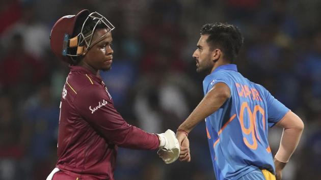 India's Deepak Chahar, right, touches the hand of West Indies' Shimron Hetmyer as he leaves the field after losing his wicket during the first one day international cricket match between India and West Indies in Chennai, India, Sunday, Dec. 15, 2019. (AP Photo/Aijaz Rahi)(AP)