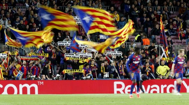 Soccer supporters show Catalan independence flags and banners at Camp Nou stadium in Barcelona. (AP) Soccer supporters show Catalan independence flags and banners at Camp Nou stadium in Barcelona. (AP)