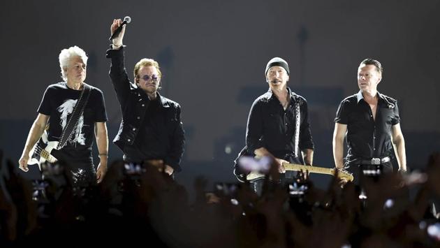 Navi Mumbai: Irish rock band U2 singer Bono with band members performs during a concert, in Navi Mumbai, Sunday, Dec. 15, 2019. (PTI Photo/Shashank Parade)(PTI12_15_2019_000236B) (PTI) Navi Mumbai: Irish rock band U2 singer Bono with band members performs during a concert, in Navi Mumbai, Sunday, Dec. 15, 2019. (PTI Photo/Shashank Parade)(PTI12_15_2019_000236B) (PTI)