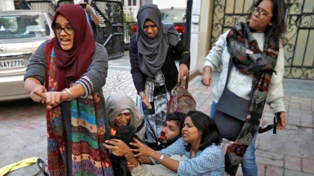 (From left, standing) Aysha Renna, Fathima Thasneem, Akhtarista; (from left, on ground) Ladeeda Sakhloon, Shaheen Abdulla and Chanda Yadav on Sunday.(REUTERS)