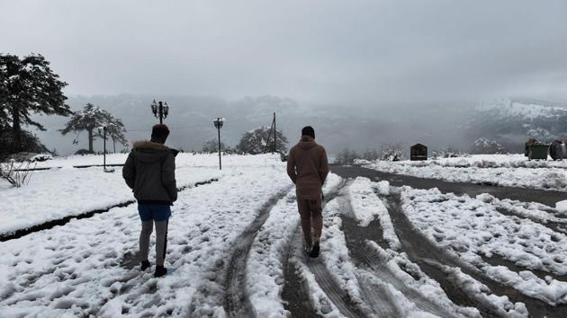 Two migrant men walk in the snow by a disused ski lodge near the village of Polineri, in Grevena, some 210km west of Thessaloniki. A part of the asylum-seekers staying at the Moria migrant and refugee camp, on the Greek island of Lesbos, were transported to the ski lodge at Vasilitsa, at an altitude of 1,000 metres and 45 kilometres (28 miles) from the nearest town of Grevena. (Sakis Mitrolidis / AFP) Two migrant men walk in the snow by a disused ski lodge near the village of Polineri, in Grevena, some 210km west of Thessaloniki. A part of the asylum-seekers staying at the Moria migrant and refugee camp, on the Greek island of Lesbos, were transported to the ski lodge at Vasilitsa, at an altitude of 1,000 metres and 45 kilometres (28 miles) from the nearest town of Grevena. (Sakis Mitrolidis / AFP)