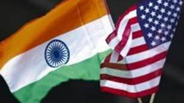 A man holds the flags of India and the US in New York in this file photo.(Reuters Photo)