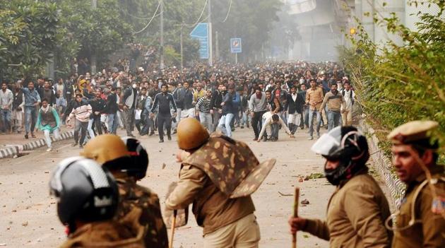 Police personnel seen as students of Jamia Millia Islamia stage a protest against the Citizenship Amendment Bill, in New Delhi, India on Friday (HT Photo) Police personnel seen as students of Jamia Millia Islamia stage a protest against the Citizenship Amendment Bill, in New Delhi, India on Friday (HT Photo)