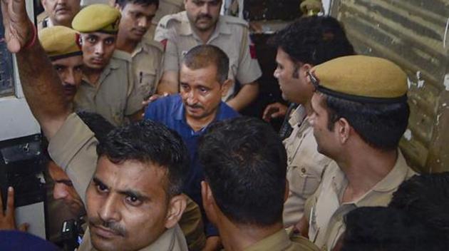 In this file photo dated Aug 5, 2019, expelled BJP MLA Kuldeep Singh Sengar is taken to Tihar jail after being produced Tis Hazari court, in New Delhi.(PTI FILE) In this file photo dated Aug 5, 2019, expelled BJP MLA Kuldeep Singh Sengar is taken to Tihar jail after being produced Tis Hazari court, in New Delhi.(PTI FILE)