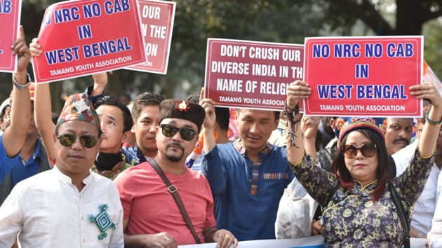 TMC supporters at a road show against the amended citizenship law. (Samir Jana/HT Photo) TMC supporters at a road show against the amended citizenship law. (Samir Jana/HT Photo)