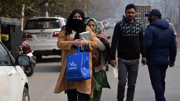 Family members of Kashmiri politicians who are under detention walk towards MLA Hostel building in Srinagar.(ANI Photo)