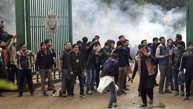 Police uses tear gas to disperse students protesting outside the Jamia Millia Islamia University against the Citizenship Amendment Bill, in New Delhi, India, Friday, Dec. 13, 2019. (AP) Police uses tear gas to disperse students protesting outside the Jamia Millia Islamia University against the Citizenship Amendment Bill, in New Delhi, India, Friday, Dec. 13, 2019. (AP)