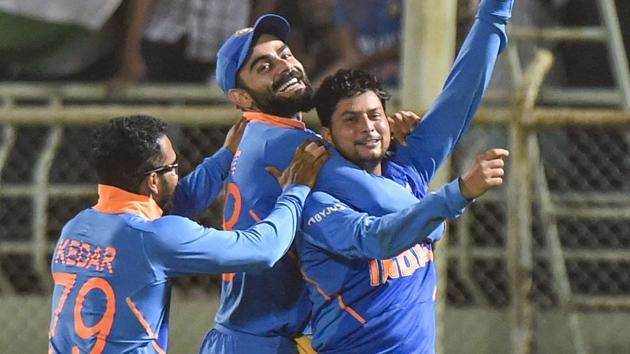 Kuldeep Yadav celebrates with skipper Virat Kohli after completing his hat-trick during the 2nd ODI against West Indies. (PTI) Kuldeep Yadav celebrates with skipper Virat Kohli after completing his hat-trick during the 2nd ODI against West Indies. (PTI)