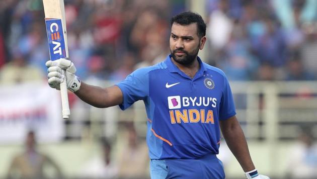 Rohit Sharma celebrates scoring a century during the second ODI between India and West Indies in Visakhapatnam.(AP)