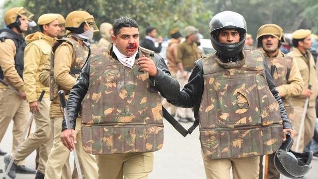 “Suddenly, 10-15 people from the crowd started throwing stones on the police personnel and a couple of buses on the road. When the police swung into action and lathi charged, others from the crowd started pelting stones and bottles. They threw bricks, stones and glass bottles. It was shocking and scary,” said Khan. “I saw two injured policemen. Sensing the tension, additional force was called in and they asked shopkeepers to shut down their shops,” added Khan. (Raj K Raj / HT Photo) “Suddenly, 10-15 people from the crowd started throwing stones on the police personnel and a couple of buses on the road. When the police swung into action and lathi charged, others from the crowd started pelting stones and bottles. They threw bricks, stones and glass bottles. It was shocking and scary,” said Khan. “I saw two injured policemen. Sensing the tension, additional force was called in and they asked shopkeepers to shut down their shops,” added Khan. (Raj K Raj / HT Photo)