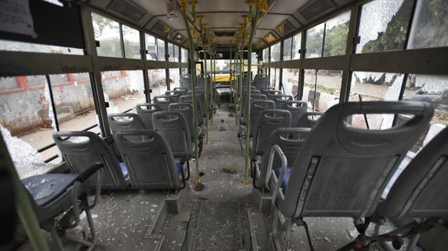 An inside view of the bus which was damaged by the protesters. Among the vehicles damaged by the protesters, there was a school van. They also torched three motorcycles and tried to set ablaze a police post on the main road between Seelampur and Jafrabad. Those injured in the clash included 15 policemen. Police officers said the protesters also tried to storm the Jafrabad police station, but the attempt was foiled. (Burhaan Kinu / HT Photo) An inside view of the bus which was damaged by the protesters. Among the vehicles damaged by the protesters, there was a school van. They also torched three motorcycles and tried to set ablaze a police post on the main road between Seelampur and Jafrabad. Those injured in the clash included 15 policemen. Police officers said the protesters also tried to storm the Jafrabad police station, but the attempt was foiled. (Burhaan Kinu / HT Photo)