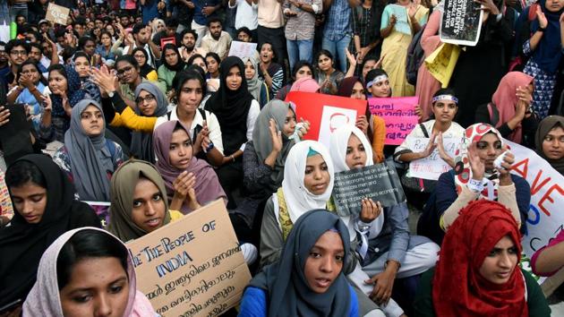 Students hold placards during a protest against the Citizenship Amendment Act. (ANI Photo) Students hold placards during a protest against the Citizenship Amendment Act. (ANI Photo)