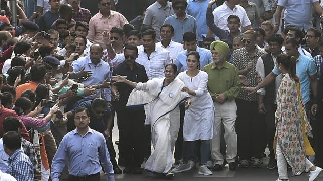 West Bengal Chief Minister Mamata Banerjee greets people as she leads a rally against the new citizenship law, in Kolkata on Tuesday.(PTI Photo) West Bengal Chief Minister Mamata Banerjee greets people as she leads a rally against the new citizenship law, in Kolkata on Tuesday.(PTI Photo)