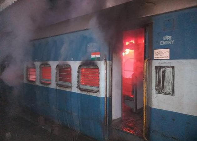 One of the three compartments of Shaheed Express, a passenger train headed for Amritsar, that caught fire near Kartarpur in Jalandhar district on Wednesday night.(Pardeep Pandit/HT)