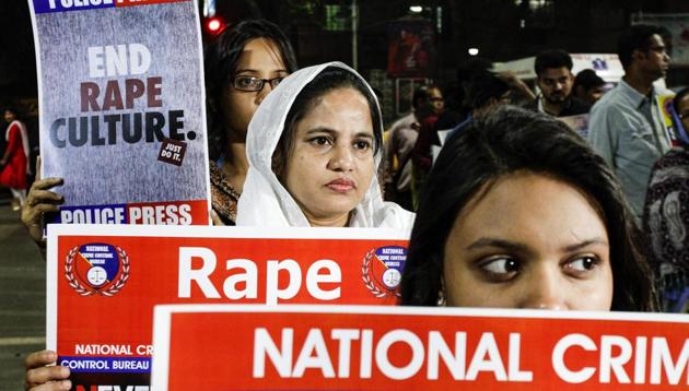 Protesters walk with placards against sexual assaults on women, in Kolkata. (AP Photo) Protesters walk with placards against sexual assaults on women, in Kolkata. (AP Photo)