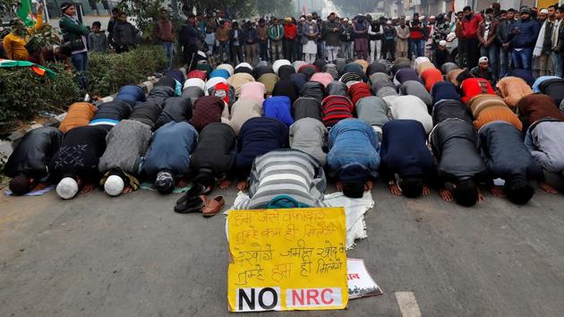 Muslims offer prayers during the protest in Delhi. At the Jantar Mantar protest site, a human chain was formed to make space for a group of Muslim protesters to offer ‘namaaz’. “We respect every religion, the government wants to divide us while there is no division in our hearts,” said Rajeeb Das, one of the protester leading the human chain formation. At another protest site near Red Fort, a group of Muslim protesters offered namaz. (Danish Siddiqui / REUTERS) 