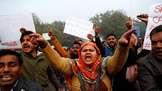 Demonstrators take part in a protest against a new citizenship law, in Delhi, on Thursday. (Reuters Photo) Demonstrators take part in a protest against a new citizenship law, in Delhi, on Thursday. (Reuters Photo)