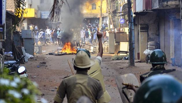Mangaluru: Police personnel during their clash with the protestors participating in a rally against the amended Citizenship Act and NRC, in Mangaluru on Thursday.(PTI Photo) Mangaluru: Police personnel during their clash with the protestors participating in a rally against the amended Citizenship Act and NRC, in Mangaluru on Thursday.(PTI Photo)