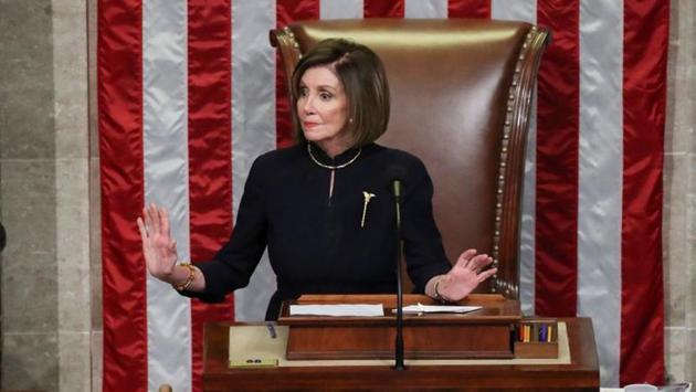 Pelosi presides over the final of two House of Representatives votes approving two counts of impeachment against US President Donald Trump. “It is tragic that the president’s reckless actions make impeachment necessary. He gave us no choice,” said Pelosi. “It is a matter of fact that the president is an ongoing threat to our national security and the integrity of our elections.” (Jonathan Ernst / REUTERS)