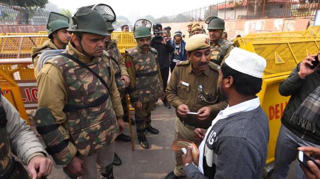 There had been heavy police deployment ahead of Friday prayers around Jama Masjid with the Delhi police officers checking identity cards of every person entering the mosque or taking photographs of those who did not have an ID Card. The CAA grants citizenship to non-Muslims of Pakistan, Afghanistan, and Bangladesh who fled religious persecution and arrived in India on or before December 31, 2014. Thus, the Act is discriminatory as it excludes Muslims from its purview. (Raj K Raj / HT Photo) There had been heavy police deployment ahead of Friday prayers around Jama Masjid with the Delhi police officers checking identity cards of every person entering the mosque or taking photographs of those who did not have an ID Card. The CAA grants citizenship to non-Muslims of Pakistan, Afghanistan, and Bangladesh who fled religious persecution and arrived in India on or before December 31, 2014. Thus, the Act is discriminatory as it excludes Muslims from its purview. (Raj K Raj / HT Photo)