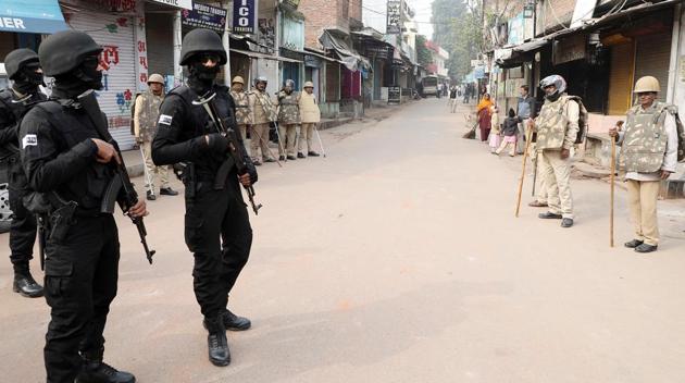 Police personnel guard a deserted street in Lucknow on Friday. Tight security measures were in force in the city with deployment of armed police to ensure peace and tranquillity during Friday prayers. Senior police officers were seen taking rounds in the city, especially the sensitive Muslim-dominated Old City areas where a person was killed during the protests on Thursday, since early morning with heavy checking at different spots. (ANI) Police personnel guard a deserted street in Lucknow on Friday. Tight security measures were in force in the city with deployment of armed police to ensure peace and tranquillity during Friday prayers. Senior police officers were seen taking rounds in the city, especially the sensitive Muslim-dominated Old City areas where a person was killed during the protests on Thursday, since early morning with heavy checking at different spots. (ANI)