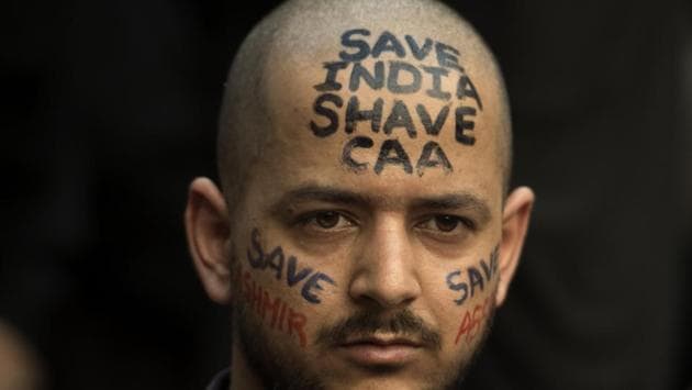A protester at a rally against CAA at Grant Road in Mumbai. (Satish Bate/HT Photo)