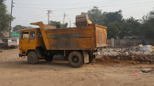 One of the MC trucks spotted at the site where illegal mining was being done in Ludhiana on Friday.(Harsimar Pal Singh/ht)