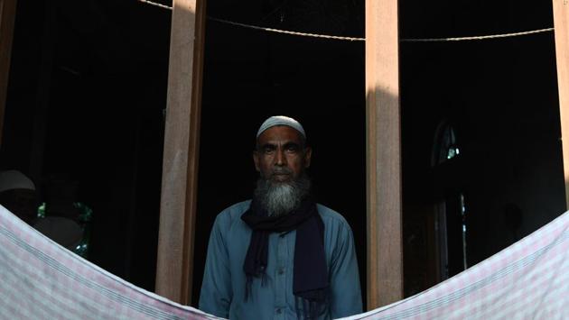 A man looks on before prayers at a mosque in Barpeta village in Assam. Habib-ur-Rehman was locked up for four years after failing to prove he’s Indian, and now worries that he might be expelled. It’s a fear shared by many other Muslims living in India. (Sajjad Hussain / AFP) A man looks on before prayers at a mosque in Barpeta village in Assam. Habib-ur-Rehman was locked up for four years after failing to prove he’s Indian, and now worries that he might be expelled. It’s a fear shared by many other Muslims living in India. (Sajjad Hussain / AFP)