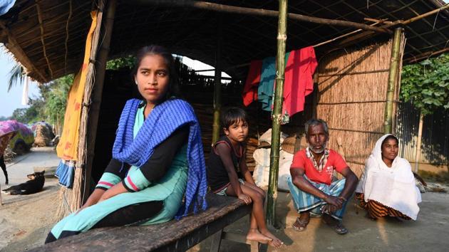 Habib-ur-Rehman (2R) sits with family members outside his home in Barpeta. “I have voted in many elections and have followed Indian laws all my life,” the father-of-four said. “They are planning to banish us from our motherland.” Assam’s register excluded 1.9 million people who now face possible statelessness, detention in camps or even deportation, although that is not feasible. (Sajjad Hussain / AFP) Habib-ur-Rehman (2R) sits with family members outside his home in Barpeta. “I have voted in many elections and have followed Indian laws all my life,” the father-of-four said. “They are planning to banish us from our motherland.” Assam’s register excluded 1.9 million people who now face possible statelessness, detention in camps or even deportation, although that is not feasible. (Sajjad Hussain / AFP)