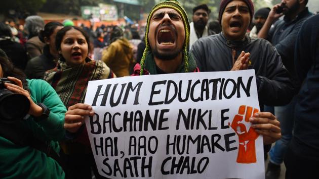 Demonstrators protest with posters and banners against CAA and NRC. (Sanchit Khanna/HT PHOTO)