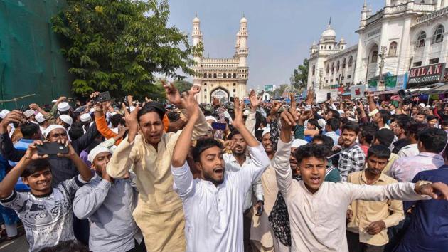 Members of the Muslim community raise slogans during a protest against CAA and NRC after afternoon prayers, in Hyderabad, Telangana. On Thursday, authorities had banned gatherings across swathes of the country including all of Uttar Pradesh and Bengaluru, areas of the north-east and parts of Bihar, New Delhi, Hyderabad and Chennai. But that did not prevent tens of thousands from taking their anger onto the streets. (PTI) Members of the Muslim community raise slogans during a protest against CAA and NRC after afternoon prayers, in Hyderabad, Telangana. On Thursday, authorities had banned gatherings across swathes of the country including all of Uttar Pradesh and Bengaluru, areas of the north-east and parts of Bihar, New Delhi, Hyderabad and Chennai. But that did not prevent tens of thousands from taking their anger onto the streets. (PTI)