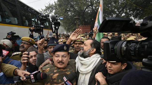 Delhi police detaining Yogendra Yadav who was protesting against the Citizenship Amendment Act (CAA) and National Register of Citizens (NRC) at Red Fort in New Delhi on December 19.(Biplov Bhuyan/HT PHOTO) Delhi police detaining Yogendra Yadav who was protesting against the Citizenship Amendment Act (CAA) and National Register of Citizens (NRC) at Red Fort in New Delhi on December 19.(Biplov Bhuyan/HT PHOTO)