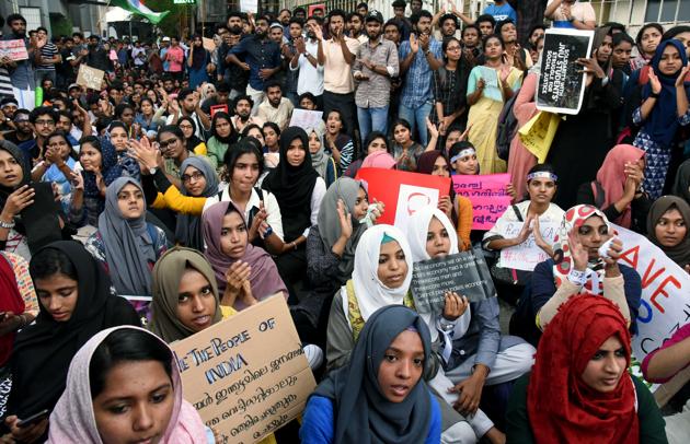 Students hold placards during a protest against the Citizenship Amendment Act, outside Reserve Bank of India in Kochi on Wednesday. (ANI Photo) Students hold placards during a protest against the Citizenship Amendment Act, outside Reserve Bank of India in Kochi on Wednesday. (ANI Photo)
