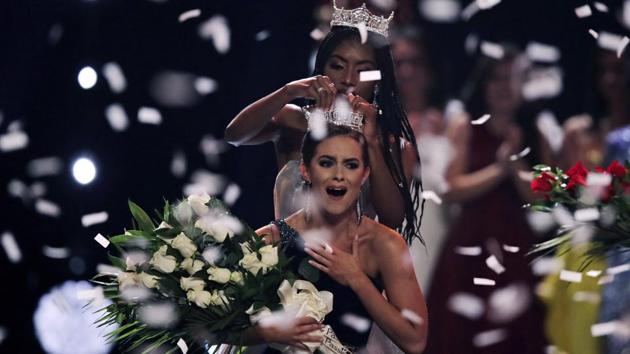 Camille Schrier, of Virginia, reacts as she is crowned after winning the Miss America competition at the Mohegan Sun casino in Uncasville, Connecticut, US. (Charles Krupa / AP) Camille Schrier, of Virginia, reacts as she is crowned after winning the Miss America competition at the Mohegan Sun casino in Uncasville, Connecticut, US. (Charles Krupa / AP)