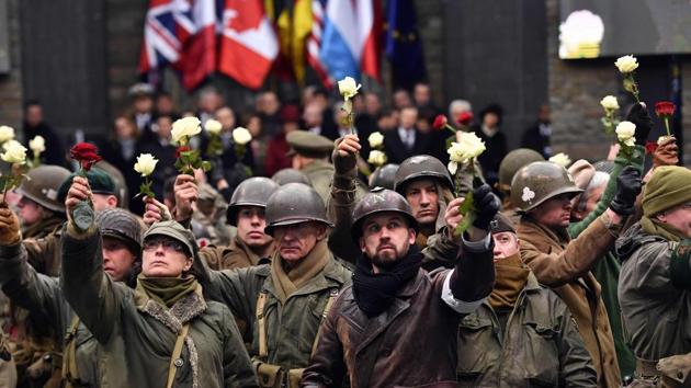 People dressed as WWII US soldiers take part in the commemorations of the 75th anniversary of the Battle of the Bulge, also known as the Ardennes Counteroffensive, on December 16, 2019, at the Mardasson Memorial in Bastogne. The Battle of the Bulge was the last major German offensive campaign on the Western Front during World War II, and took place from 16 December 1944 to 25 January 1945. (Dirk Waem / BELGA / AFP) People dressed as WWII US soldiers take part in the commemorations of the 75th anniversary of the Battle of the Bulge, also known as the Ardennes Counteroffensive, on December 16, 2019, at the Mardasson Memorial in Bastogne. The Battle of the Bulge was the last major German offensive campaign on the Western Front during World War II, and took place from 16 December 1944 to 25 January 1945. (Dirk Waem / BELGA / AFP)