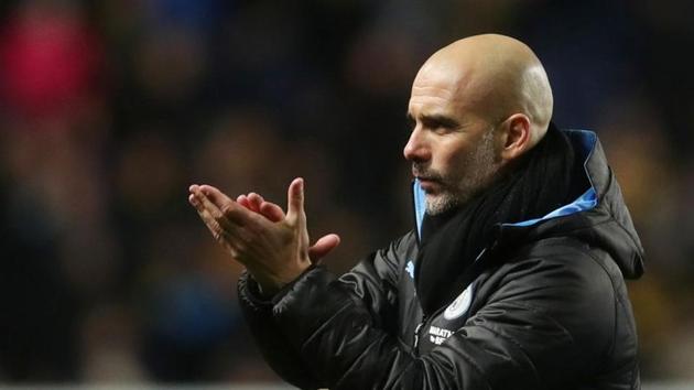 Soccer Football - Carabao Cup - Quarter Final - Oxford United v Manchester City - Kassam Stadium, Oxford, Britain - December 18, 2019 Manchester City manager Pep Guardiola applauds fans after the match REUTERS/Chris Radburn (REUTERS) Soccer Football - Carabao Cup - Quarter Final - Oxford United v Manchester City - Kassam Stadium, Oxford, Britain - December 18, 2019 Manchester City manager Pep Guardiola applauds fans after the match REUTERS/Chris Radburn (REUTERS)