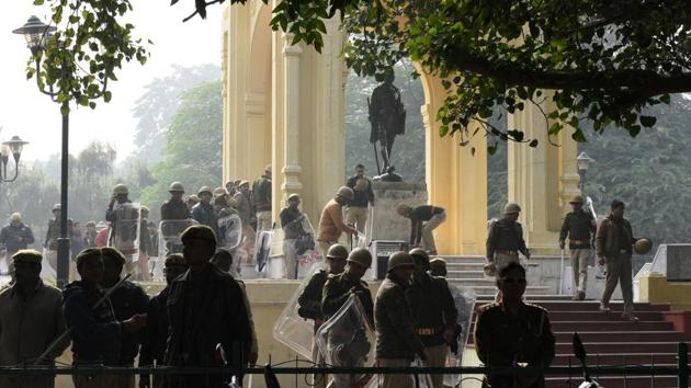Police personnel stand guard after Section 144 was imposed amid ongoing protests, at Gandhi Statue, Hazratganj, in Lucknow, UP. Internet services will remain suspended in the city till Monday, a senior official said on Saturday. The services in the city were suspended on Thursday night after violent protests against CAA. “Internet services have been suspended till December 23 in Lucknow,” said District Magistrate Abhishek Prakash. (Dheeraj Dhawan / HT Photo)
