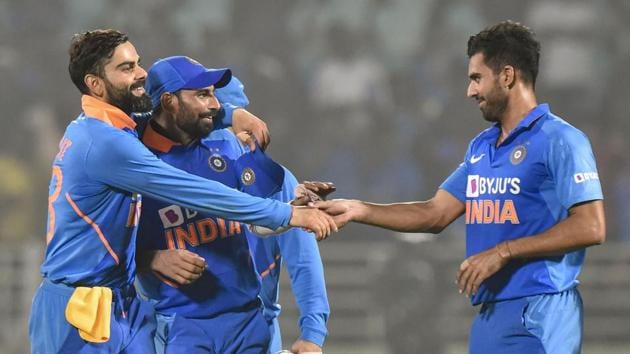 Indian captain Virat Kohli celebrates with pacers Md Shami and Deepak Chahar after their win in the 2nd ODI cricket match against West Indies at ACA-VDCA Cricket Stadium in Visakhapatnam, Wednesday, Dec. 18, 2019.(PTI)