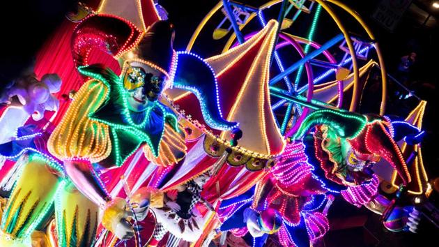 Revelers take part in the Light Festival parade in San Jose, Costa Rica on December 14, 2019. (Ezequiel Becerra / AFP) Revelers take part in the Light Festival parade in San Jose, Costa Rica on December 14, 2019. (Ezequiel Becerra / AFP)
