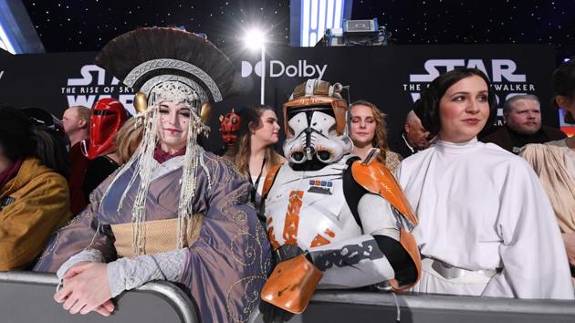 Fans in Star Wars costumes attend the world premiere of Disney’s “Star Wars: Rise of Skywalker” at the TCL Chinese Theatre in Hollywood, California on December 16, 2019. (Valerie Macon / AFP) Fans in Star Wars costumes attend the world premiere of Disney’s “Star Wars: Rise of Skywalker” at the TCL Chinese Theatre in Hollywood, California on December 16, 2019. (Valerie Macon / AFP)