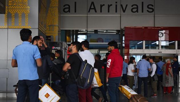 Illegal Indian immigrants after they were deported from the US, at Terminal 3, IGI airport, in New Delhi. (Sanchit Khanna/HT PHOTO) Illegal Indian immigrants after they were deported from the US, at Terminal 3, IGI airport, in New Delhi. (Sanchit Khanna/HT PHOTO)