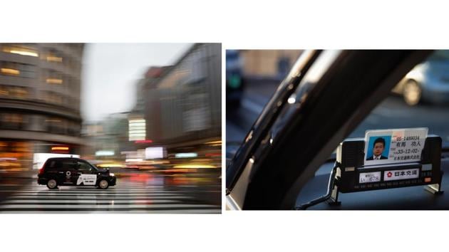 A taxi passes through Ginza and Norihito Arima’s permit on his dashboard. Taxi service has been a concern at some Olympics: poorly trained drivers, dilapidated cars, and sloppy dress. A decade ago in Beijing, the government published edicts for drivers to stop spitting, clean their taxis, and warned about eating on the job. Customers also got lessons on queueing. This shouldn’t be at problem at next year’s Tokyo Olympics. (Jae C. Hong / AP) 