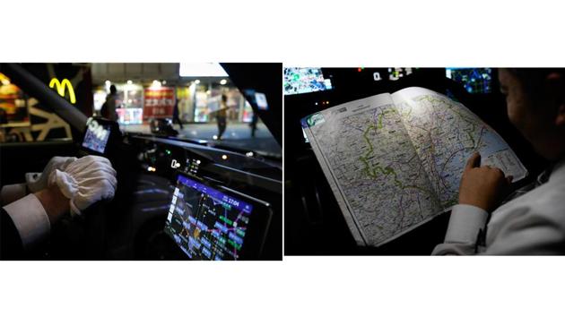 Norihito Arima waits for traffic light to change in the Shinjuku district (L) and studies the map of Tokyo in his taxi while taking a break outside a convenient store. Japan is not perfect, of course. Commuters often push to get on crowded subway trains or bump into anonymous strangers on the sidewalk without apology. Westerns usually receive great service, but some other non-Japanese complain they do not. (Jae C. Hong / AP) 
