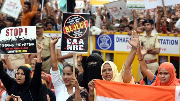 Protestors raise slogans during a demonstration against the Citizenship Amendment Act (CAA). (PTI Photo (Representative image)) Protestors raise slogans during a demonstration against the Citizenship Amendment Act (CAA). (PTI Photo (Representative image))