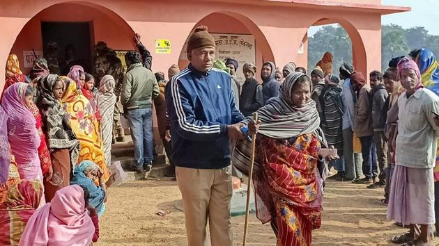 An elderly voter leaves after casting her vote during the fifth phase of Jharkhand Assembly Elections, in Dumka, Jharkhand. (PTI) An elderly voter leaves after casting her vote during the fifth phase of Jharkhand Assembly Elections, in Dumka, Jharkhand. (PTI)