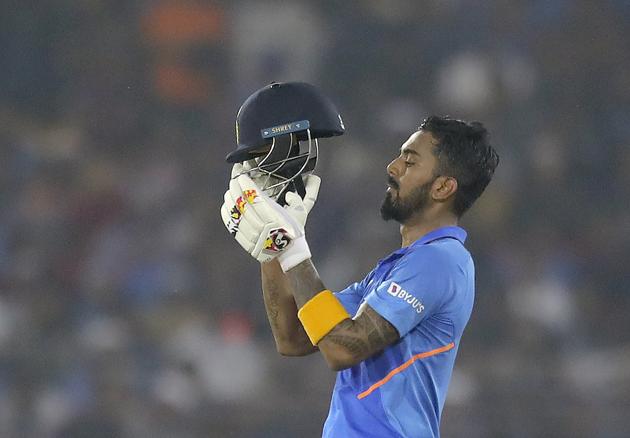 India's K L Rahul prepares to wear helmet. (AP)