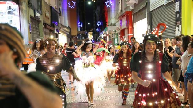 PHOTOS | Merry Christmas 2019: Costumed folk walk the streets of Brazil