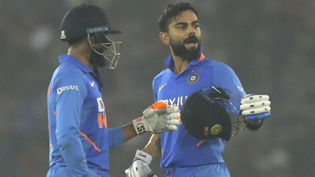 India's captain Virat Kohli, right, reacts after playing a shot.(AP)